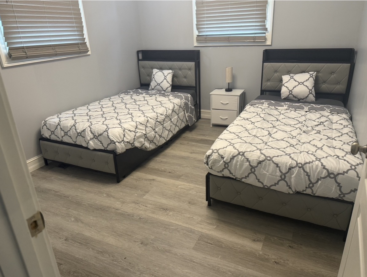 A second furnished bedroom inside Activity House